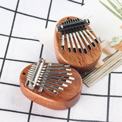 8-Key Mini Kalimba Thumb Piano – Portable Finger Harp for Beginners & Kids
